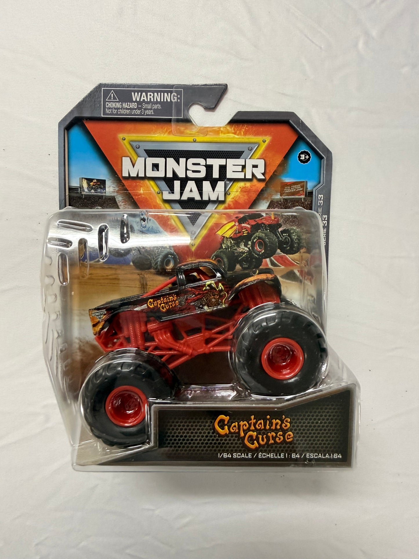 Monster Jam toy truck in packaging on a white background
