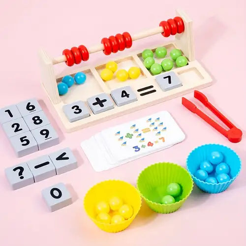 Educational math toy set with abacus, number blocks, and color sorting bowls on a pink background