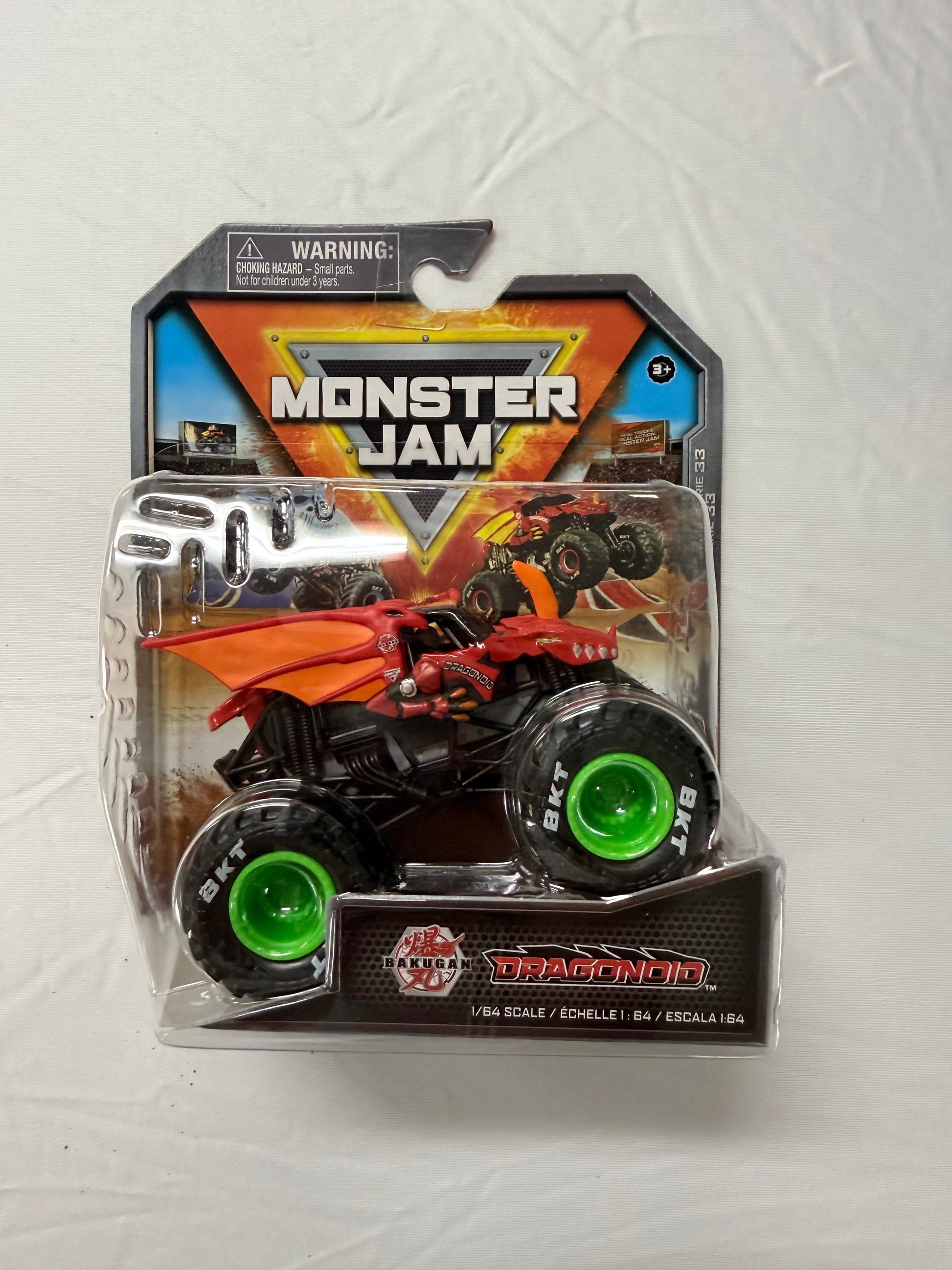 Monster Jam toy truck in packaging on a white background